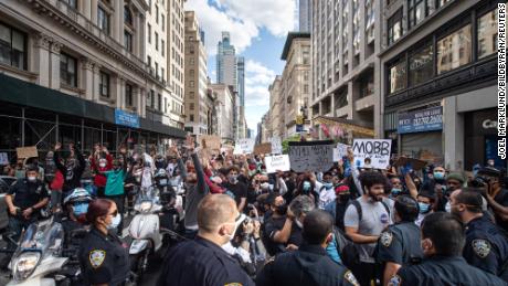 Demonstrators at 5th Avenue during a protest over the death of George Floyd, on May 31, 2020 in the Manhattan borough of New York.