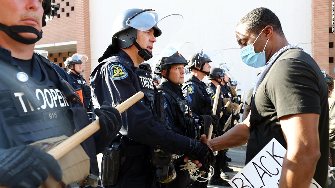 Officers joined protesters this weekend at George Floyd demonstrations ...