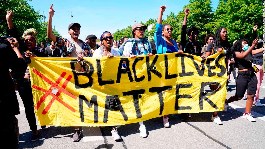 People protest during a Black Lives Matter demonstration in front of the US Embassy in Copenhagen, Denmark, on Sunday.