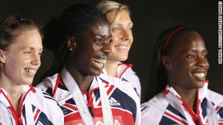 Britain&#39;s Lee Mcconnell, Christine Ohuruogu, Nicola Sanders and Okoro celebrate on the podium after the women&#39;s 4x400m relay final, 02 September 2007, at the 11th IAAF World Athletics Championships, in Osaka. USA won ahead of Jamaica and Britian.