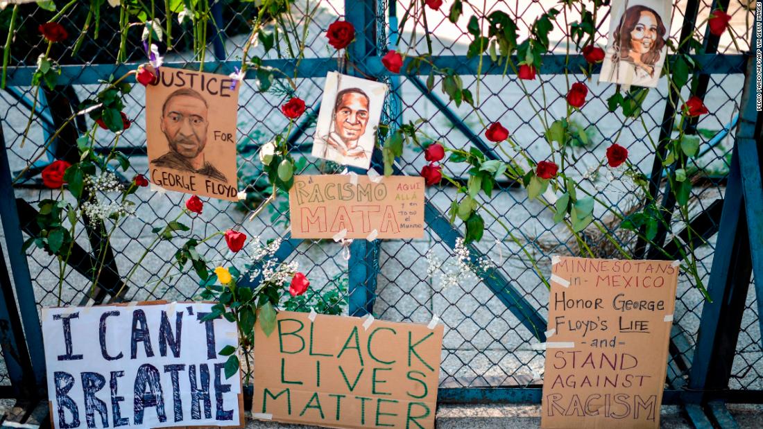 Signs and flowers outside the US embassy in Mexico City.