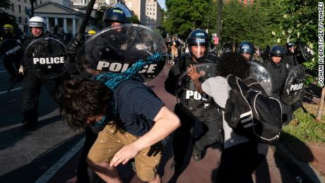 WASHINGTON, DC - JUNE 1: Police clash with protesters during a demonstration on June 1, 2020 in Washington, DC. Thousands of protesters took to the streets throughout Washington to continue to show anger after the death of George Floyd while in police custody in Minneapolis. Police officer Derek Chauvin was filmed kneeling on Floyd&#39;s neck before he was later pronounced dead at a local hospital. Floyd&#39;s death, the most recent in a series of deaths of black Americans at the hands of police, has set off days and nights of protests across the country. (Photo by Joshua Roberts/Getty Images)