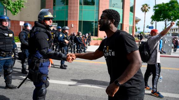 Police Officers Are Joining Protesters For Prayers And Hugs In Several 