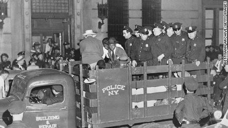 Suspects in a Harlem &quot;race riot&quot; were driven to jail in August 1943.