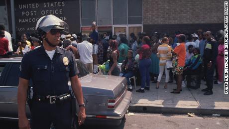 Demonstrators gather near the Los Angeles post office during the 1992 riots.