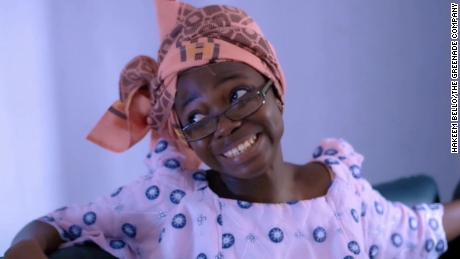 Taaooma plays the role of Iya Tao (her mother), wearing headgear and a dress sewn from local materials, in a video that&#39;s become popular in Nigeria.