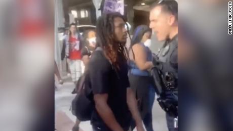 A cop pushed a protester. Then a black officer stepped in