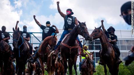 Protesters march in downtown Houston.