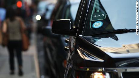 An Uber SUV waits for a client in Manhattan a day after it was announced that Uber co-founder Travis Kalanick will take a leave of absence as chief executive on June 14, 2017 in New York City. The move came after former attorney general Eric H. Holder Jr. and his law firm, Covington &amp; Burling, released 13 pages of recommendations compiled as part of an investigation of sexual harassment at the ride-hailing car service. 