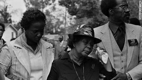 Beulah Donald, center, weeps as she enters her son, Michael&#39;s, funeral in 1981. 