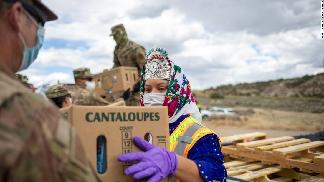 Shaandiin P. Parrish, Miss Navajo Nation, helps distribute food and other supplies to Navajo families in Counselor, New Mexico, on May 27. Navajo Nation &lt;a href=&quot;http://www.cnn.com/2020/05/18/us/navajo-nation-infection-rate-trnd/index.html&quot; target=&quot;_blank&quot;&gt;has been hit hard by the coronavirus.&lt;/a&gt;