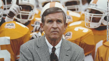 Majors is surrounded by members of the Tennessee Volunteers during a game against the University of Notre Dame in November 1990.