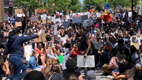 Ryan Jones and his 15-year-old son attended a crowded demonstration in State College, Pennsylania.