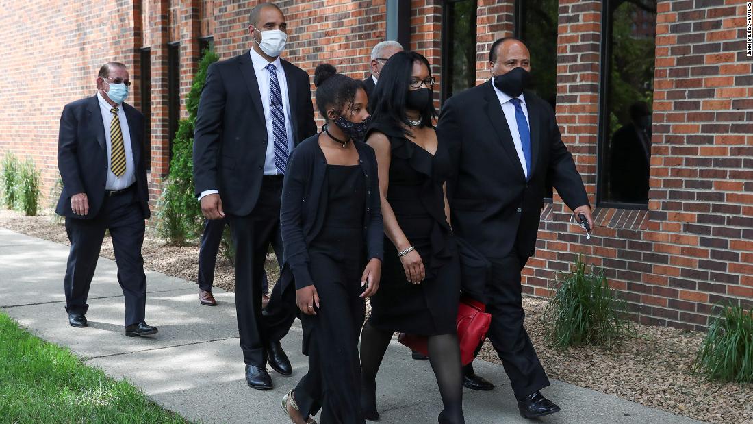 Martin Luther King III, right, arrives with his family.