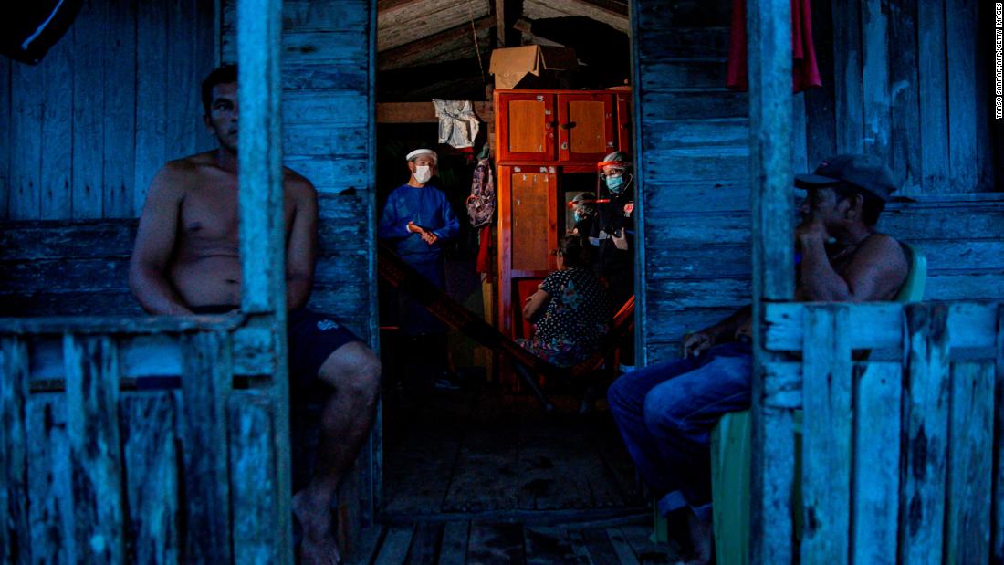 Government health workers test a resident on the Brazilian island of Marajo on June 1, 2020.