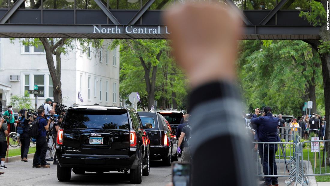 A hearse carrying Floyd&#39;s casket departs after his memorial service in Minneapolis on Thursday.