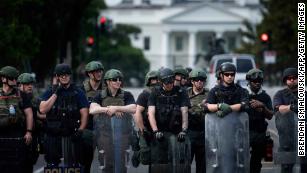 Trump's use of unidentified security forces echoes Putin's 'little green men'