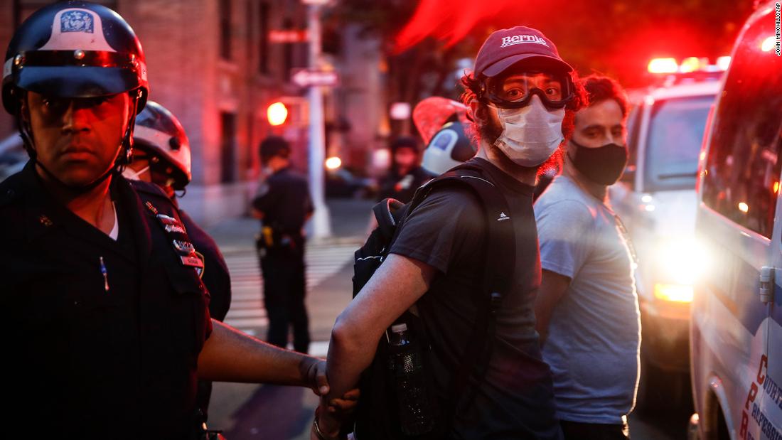 Protesters are arrested after violating curfew in New York on June 5.