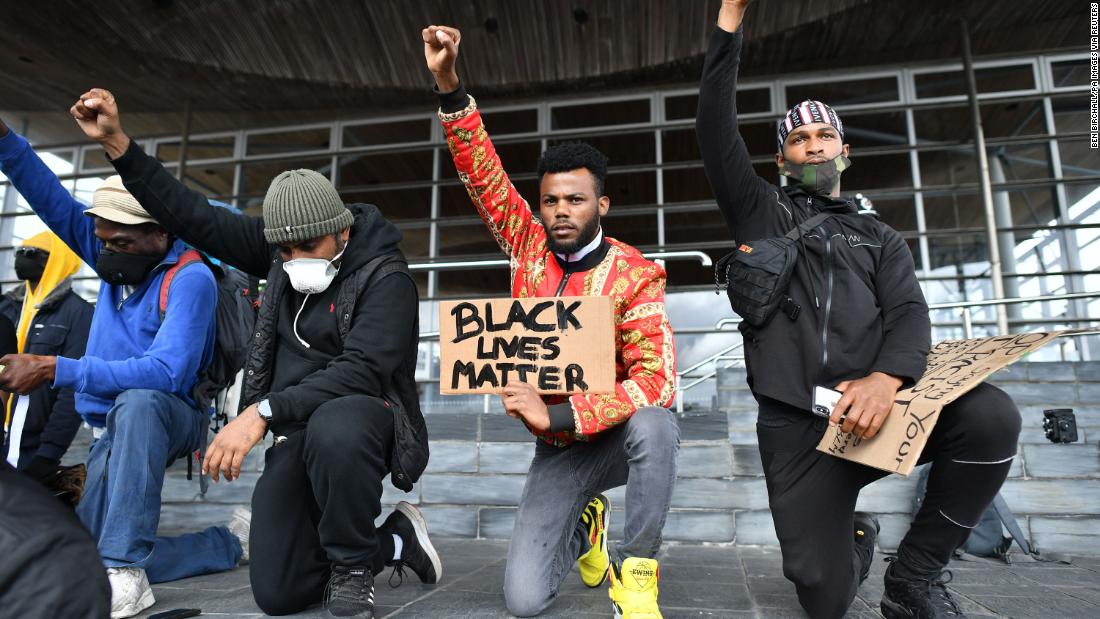 People take part in a Black Lives Matter rally in Cardiff, Wales.