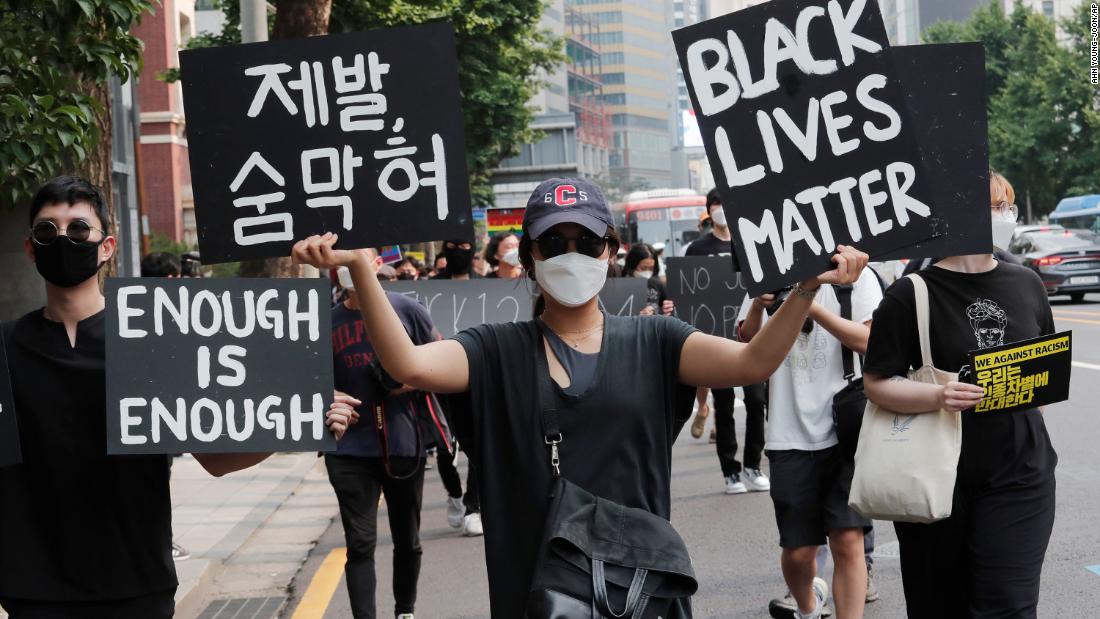 A woman at a solidarity march in Seoul, South Korea, to protest against racism.