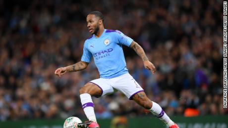 Sterling runs with the ball during the Carabao Cup Semi Final match against Manchester United.