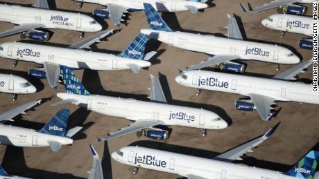 MARANA, ARIZONA - MAY 16: Decommissioned and suspended jetBlue commercial aircrafts are seen stored in Pinal Airpark on May 16, 2020 in Marana, Arizona.  Pinal Airpark is the largest commercial aircraft storage facility in the world, currently holding increased numbers of aircraft in response to the coronavirus COVID-19 pandemic.   (Photo by Christian Petersen/Getty Images)