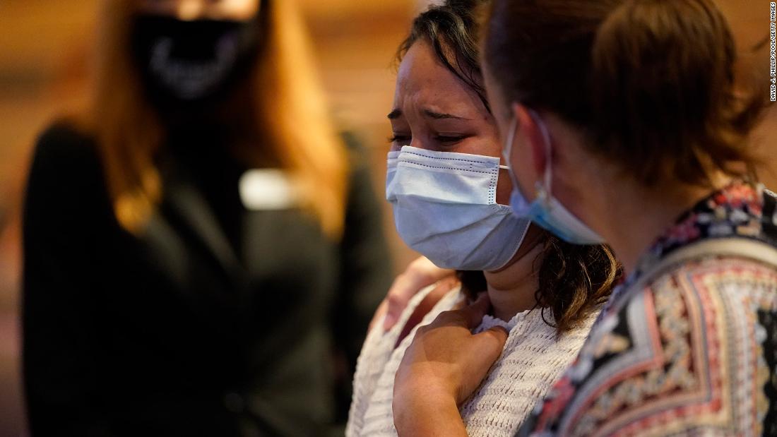 People grieve near Floyd&#39;s casket on Monday.