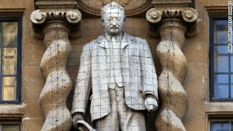 Who is Cecil Rhodes and why are UK demonstrators protesting at his statue?