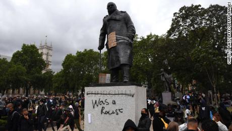 A statue of Winston Churchill outside Parliament was daubed with the words, &quot;was a racist,&quot; during a protest in June. 