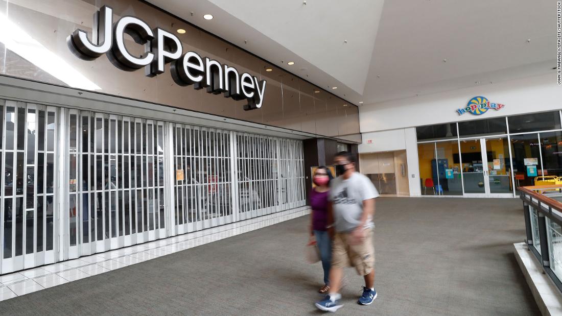 Woman Waling With Jcpenney And Victorias Secret Shopping Bag In