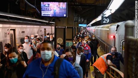 Commuters arrive at New York City&#39;s Grand Central Station on Monday.