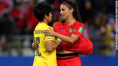 Alex Morgan of the USA consoles Sukanya Chor Charoenying of Thailand after USA&#39;s victory in the 2019 FIFA Women&#39;s World Cup