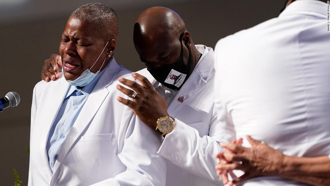 LaTonya Floyd gets emotional while speaking during her brother&#39;s funeral on Tuesday.