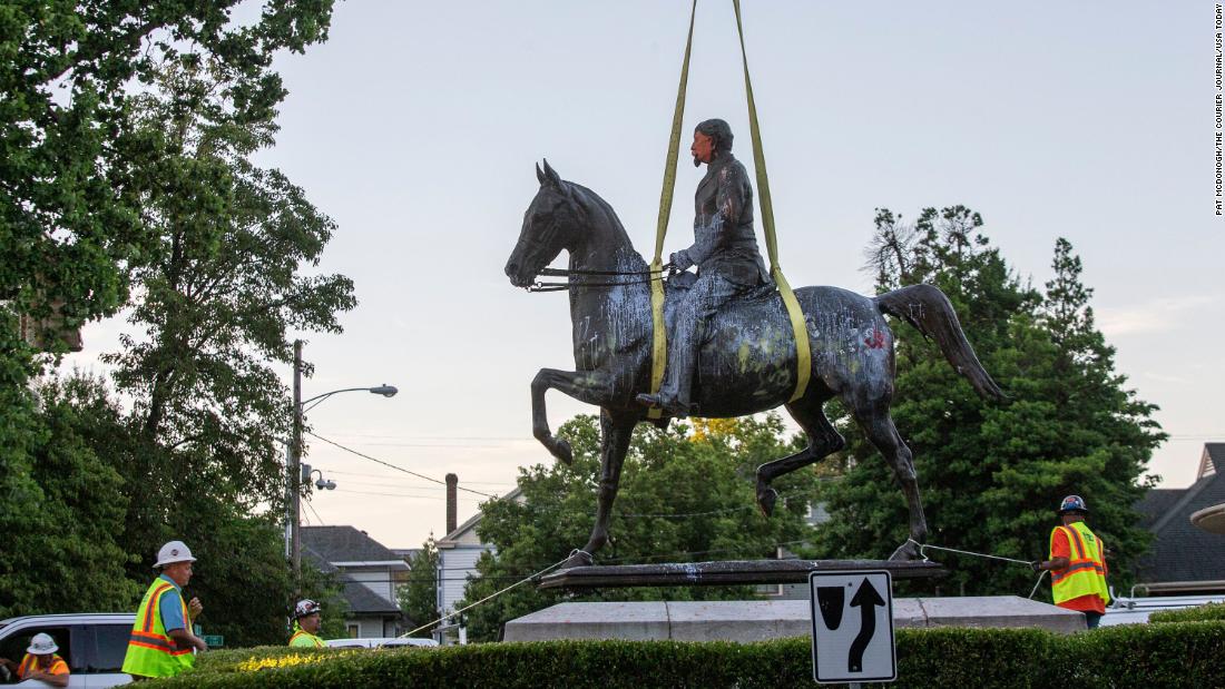 The John B. Castleman statue, in Louisville&#39;s Cherokee Triangle neighborhood, was removed from its pedestal where it stood for over 100 years. The statue to the controversial Castleman has been vandalized often over the last ten years. The statue is lifted off its base. June 8. 2020