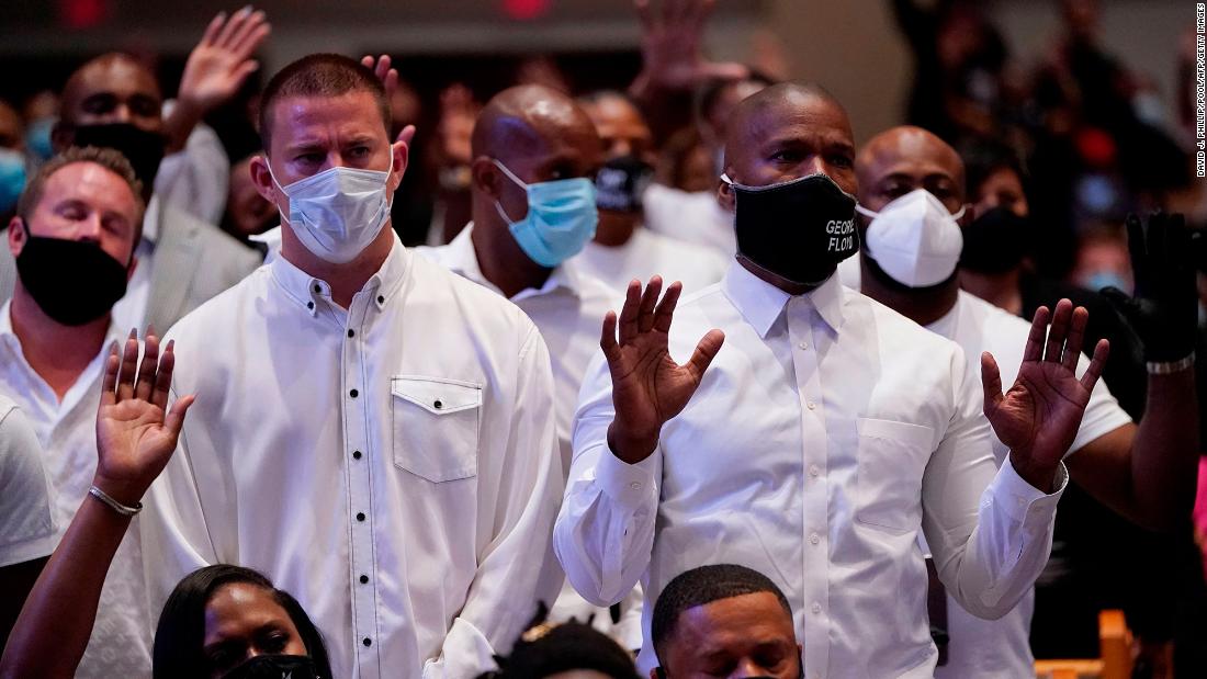 Actors Channing Tatum, left, and Jamie Foxx attend the funeral.