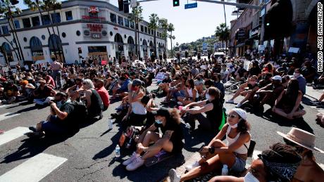 Demonstrators stage a sit-in on Tuesday, June 9, on Sunset Boulevard in Los Angeles during a protest over the death of George Floyd.