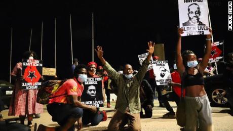 Demonstrators gathered at Black Star Square in Accra, Ghana, on Saturday evening to campaign against racial injustice. One of them Kuukua Eshun, took these pictures and told CNN she fell and injured her elbow during the protest. 