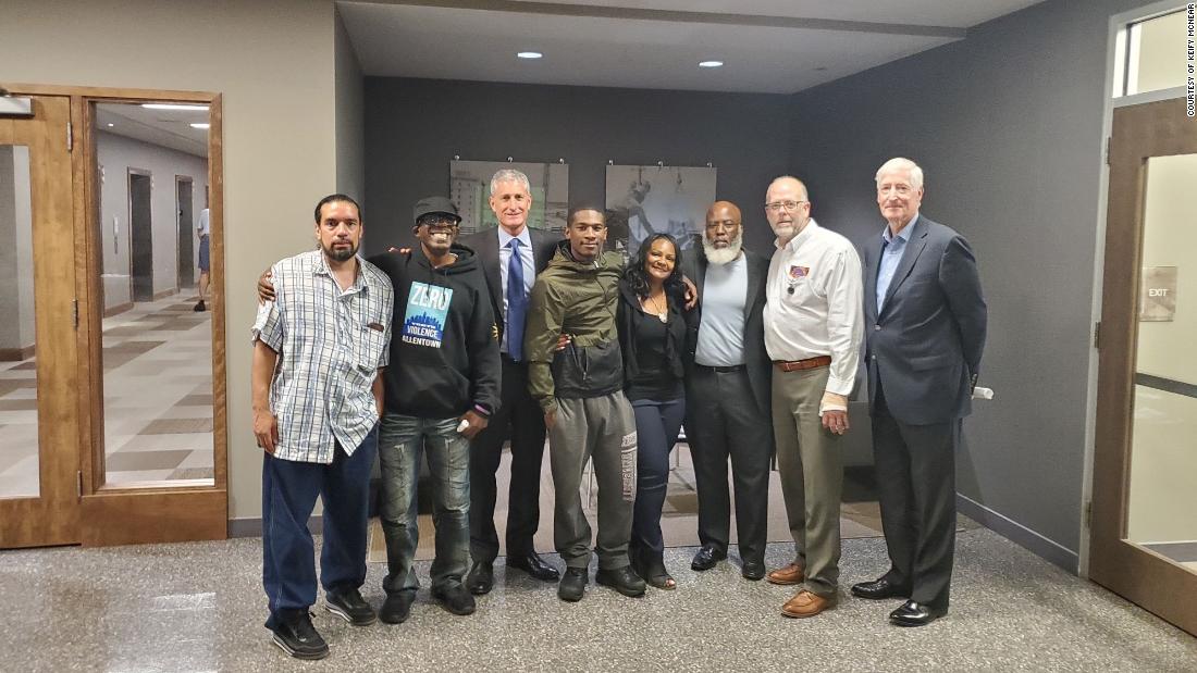 After a series of shootings last summer, developer J.B. Reilly (third from left) agreed to take a neighborhood tour with representatives of Promise Neighborhoods to better understand how the city's communities of color weren't benefiting equally from Allentown's revival.