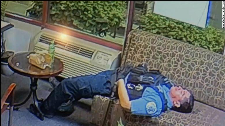 One still image released by the mayor&#39;s office shows an officer appearing to sleep on an office couch.
