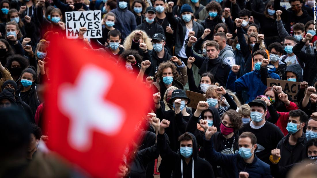 People demonstrate against racism during a protest on June 13 in Lausanne, Switzerland.