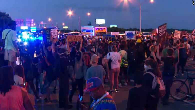 Hundreds protest after man fatally shot by police