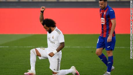 Marcelo knelt on one knee and raised his fist in a sign of solidarity with the Black Lives Matter movement after scoring Real&#39;s third goal.