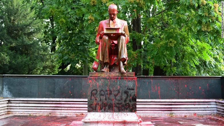 The statue of journalist Indro Montanelli was defaced, stained with red paint and tagged with the inscription &quot;racist, rapist.&quot; 