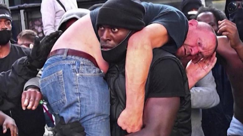 UK Black Lives Matter Patrick Hutchinson rescue opposing protester Abdelaziz intv intl hnk vpx_00001129
