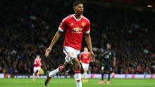 Rashford celebrates scoring on his United debut, against FC Midtjylland in the Europa League at Old Trafford on February 25, 2016.