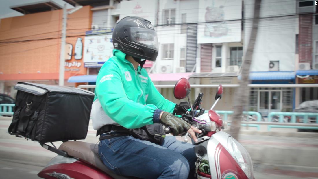 When flight assignments in Thailand dried up, Nakarin Inta put his speedy pilot skills to use zipping through Bankgok's streets to deliver food.