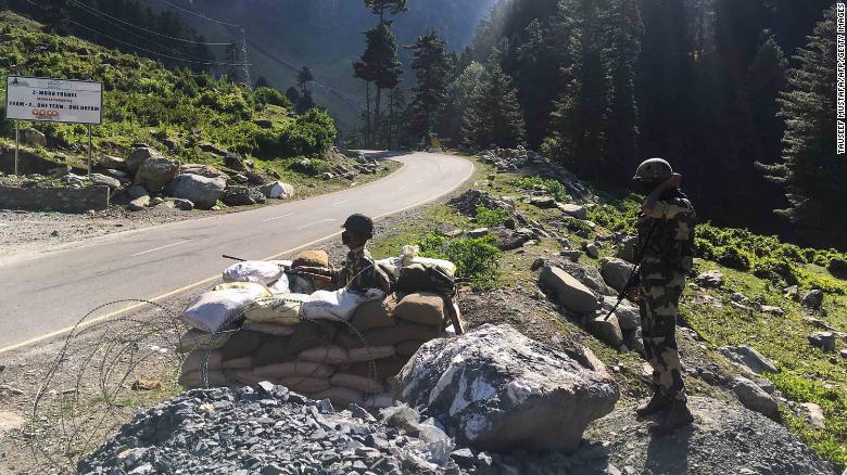 Indian Border Security Force soldiers guard a highway leading towards Leh, bordering China, in Gagangir on June 17, 2020.