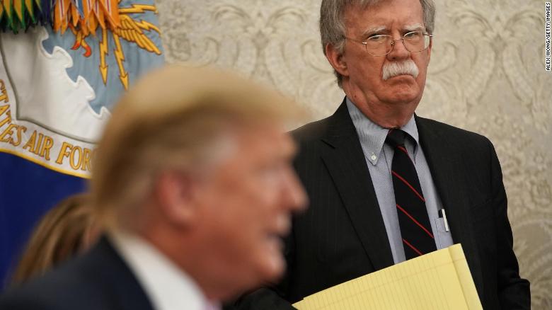 Then-national security adviser John Bolton listens to President Donald Trump during a meeting with Egyptian President Abdel-Fattah el-Sisi in April 2019.