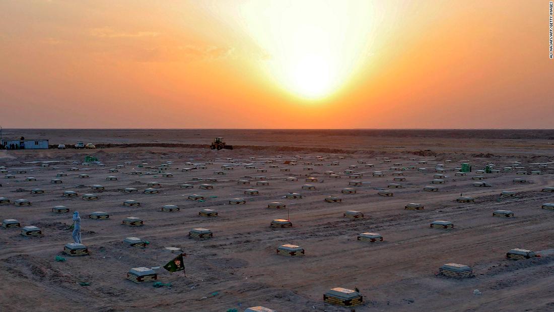 The sun sets over a cemetery for coronavirus victims near Najaf, Iraq.