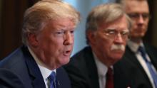 WASHINGTON, DC - APRIL 09:  U.S. President Donald Trump is flanked by National Security Advisor John Bolton as he speaks about the FBI raid at his lawyer Michael Cohen's office, while receiving a briefing from senior military leaders regarding Syria,  in the Cabinet Room, on April 9, 2018 in Washington, DC. The FBI raided the office of Michael Cohen on Monday as part of the ongoing investigation into the president's administration. (Photo by Mark Wilson/Getty Images)